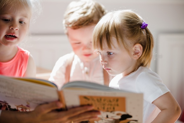 Image of children reading book